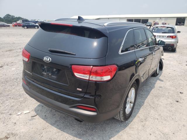 Photo 4 from auction – 2016 KIA SORENTO LX with VIN 5XYPG4A34GG168013