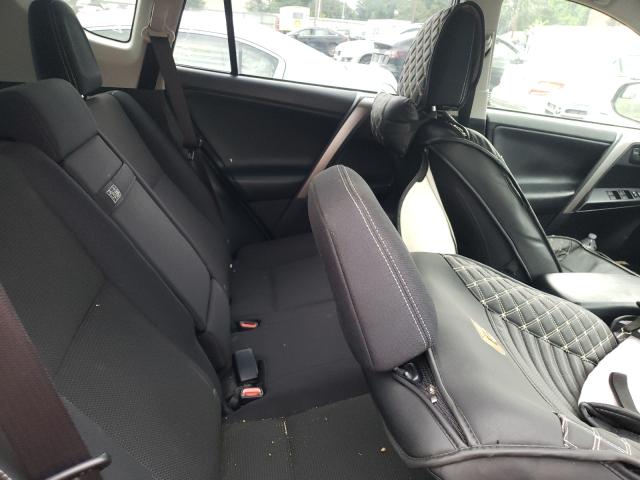 Photo 6 from auction – 2018 TOYOTA RAV4 HV LE with VIN JTMRJREV9JD226335