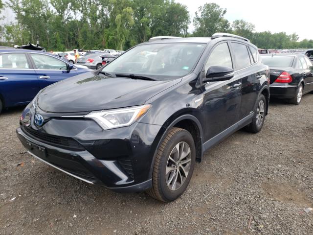 Photo 2 from auction – 2018 TOYOTA RAV4 HV LE with VIN JTMRJREV9JD226335