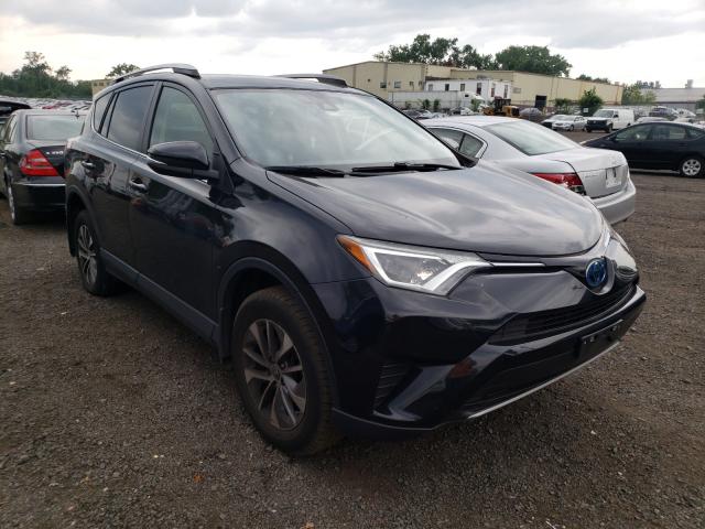 Photo 1 from auction – 2018 TOYOTA RAV4 HV LE with VIN JTMRJREV9JD226335