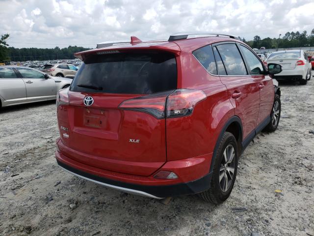 Photo 4 from auction – 2016 TOYOTA RAV4 XLE with VIN 2T3WFREV8GW270097