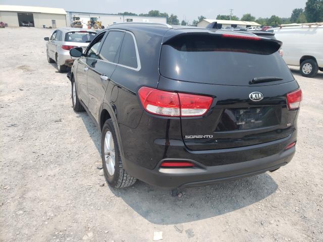 Photo 3 from auction – 2016 KIA SORENTO LX with VIN 5XYPG4A34GG168013