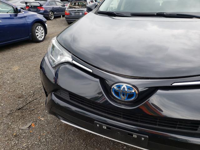 Photo 9 from auction – 2018 TOYOTA RAV4 HV LE with VIN JTMRJREV9JD226335