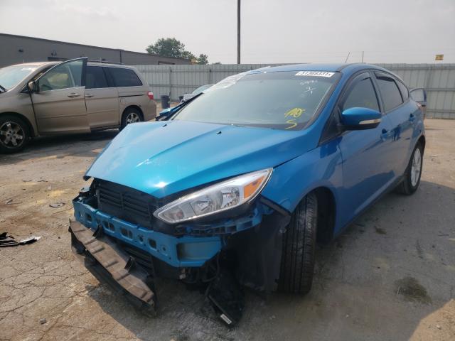 Photo 2 from auction – 2016 FORD FOCUS SE with VIN 1FADP3K22GL355991