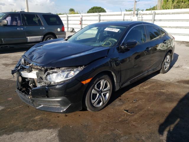 Photo 2 from auction – 2018 HONDA CIVIC LX with VIN 2HGFC2F54JH581999