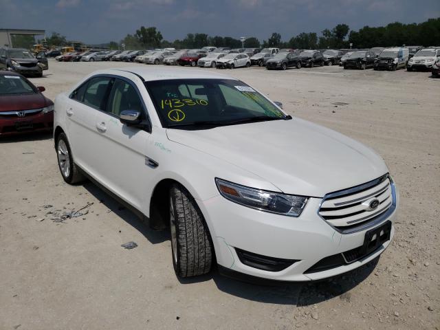 FORD TAURUS LIM 2014 with VIN 1FAHP2F8XEG143310 - Photo from auction