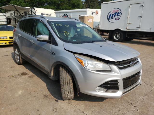 FORD ESCAPE TIT 2016 with VIN 1FMCU9J99GUA77872 - Photo from auction