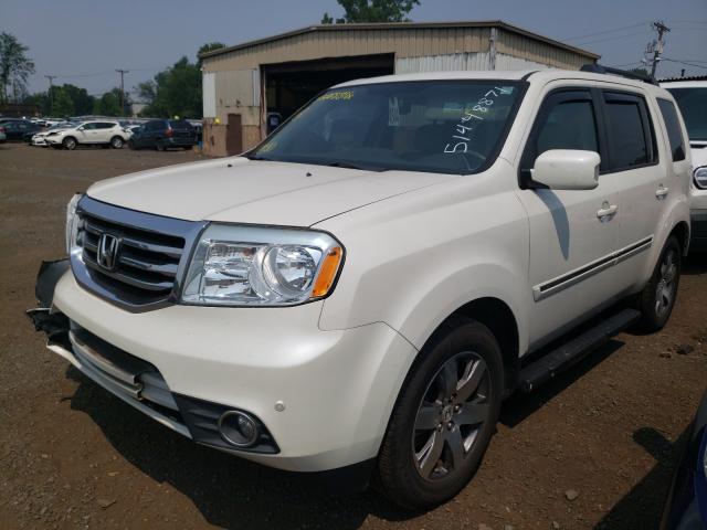 Photo 2 from auction – 2013 HONDA PILOT TOUR with VIN 5FNYF4H97DB067794