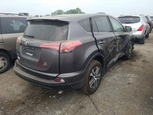 Photo 4 from auction – 2018 TOYOTA RAV4 LE with VIN 2T3BFREVXJW763267