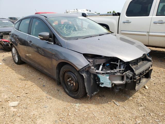FORD FOCUS TITA 2014 with VIN 1FADP3N21EL409158 - Photo from auction