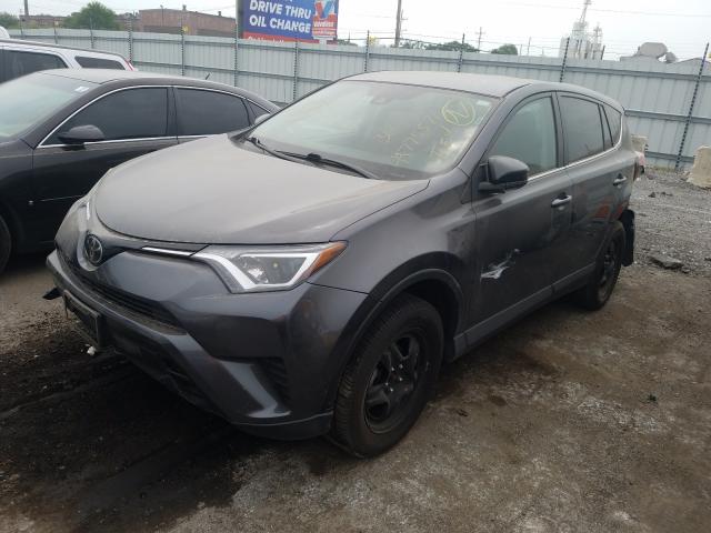 Photo 2 from auction – 2018 TOYOTA RAV4 LE with VIN 2T3BFREVXJW763267