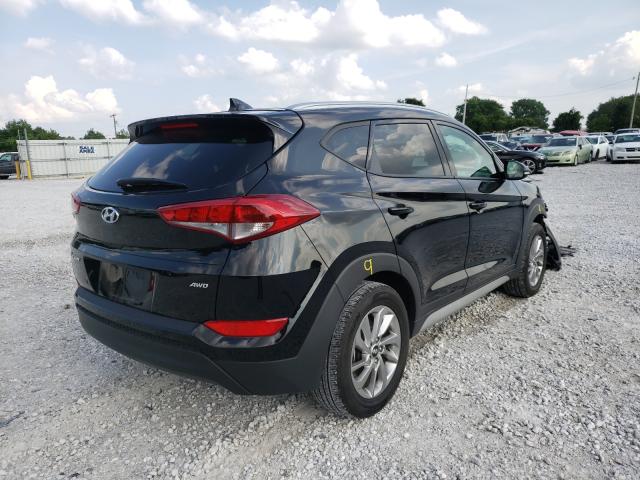 Photo 4 from auction – 2018 HYUNDAI TUCSON SEL with VIN KM8J3CA45JU651208