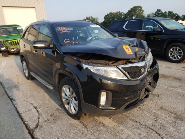 KIA SORENTO EX 2015 with VIN 5XYKU4A79FG582389 - Photo from auction