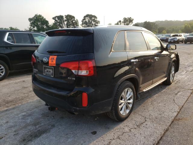 Photo 4 from auction – 2015 KIA SORENTO EX with VIN 5XYKU4A79FG582389