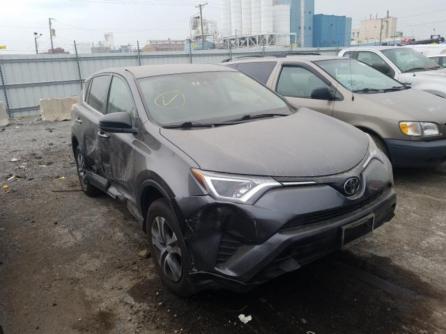 TOYOTA RAV4 LE 2018 with VIN 2T3BFREVXJW763267 - Photo from auction