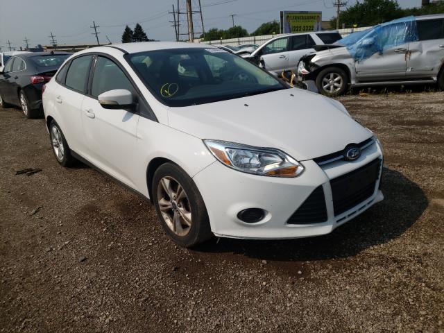 FORD FOCUS SE 2014 with VIN 1FADP3F20EL391153 - Photo from auction