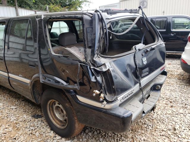 Photo 9 from auction – 1999 GMC JIMMY with VIN 1GKCS13W2X2528896