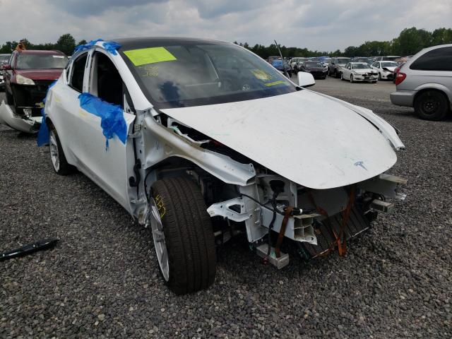 TESLA MODEL Y 2020 with VIN 5YJYGDEF7LF017922 - Photo from auction