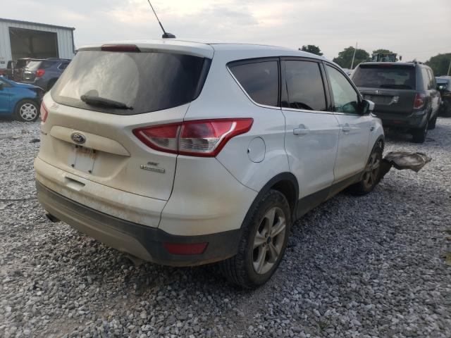 Photo 4 from auction – 2014 FORD ESCAPE SE with VIN 1FMCU0GXXEUE10997