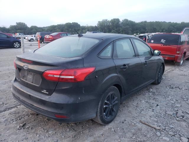 Photo 4 from auction – 2015 FORD FOCUS SE with VIN 1FADP3F26FL307631