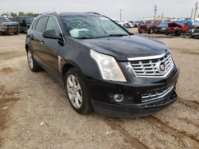 CADILLAC SRX PREMIU 2015 with VIN 3GYFNGE33FS585255 - Photo from auction