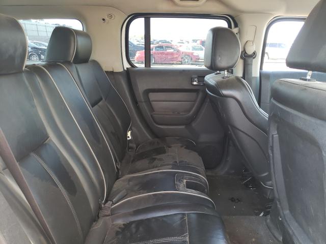 Photo 6 from auction – 2006 HUMMER H3 with VIN 5GTDN136168102368