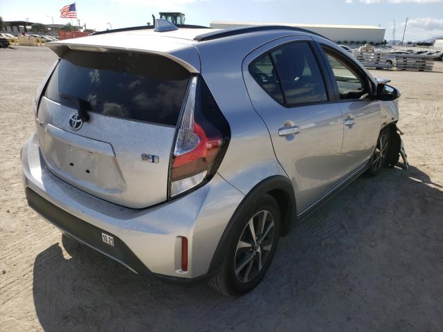 Photo 4 from auction – 2018 TOYOTA PRIUS C with VIN JTDKDTB3XJ1609601