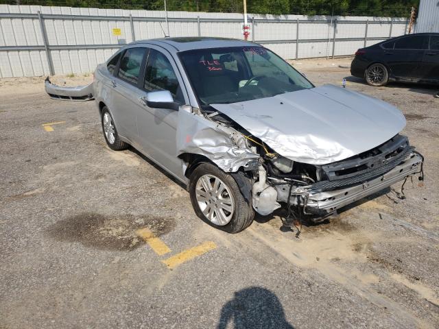 FORD FOCUS SEL 2011 with VIN 1FAHP3HN8BW105021 - Photo from auction