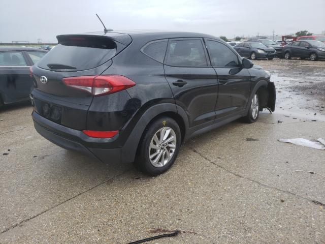 Photo 4 from auction – 2017 HYUNDAI TUCSON SE with VIN KM8J23A42HU313875