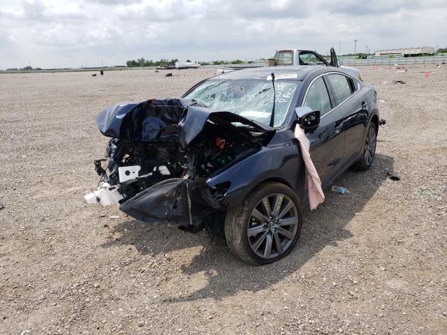 Photo 2 from auction – 2021 MAZDA 6 TOURING with VIN JM1GL1VM4M1613200