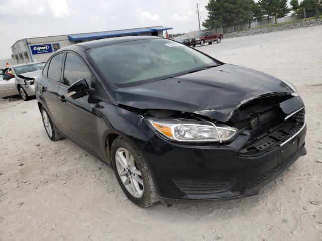 FORD FOCUS SE 2016 with VIN 1FADP3F26GL386977 - Photo from auction