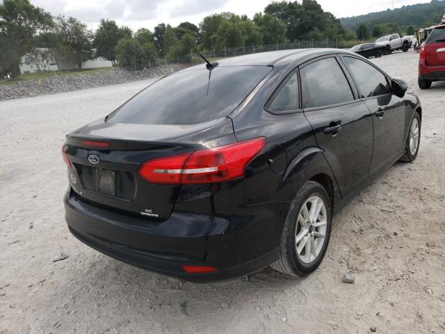 Photo 4 from auction – 2016 FORD FOCUS SE with VIN 1FADP3F26GL386977