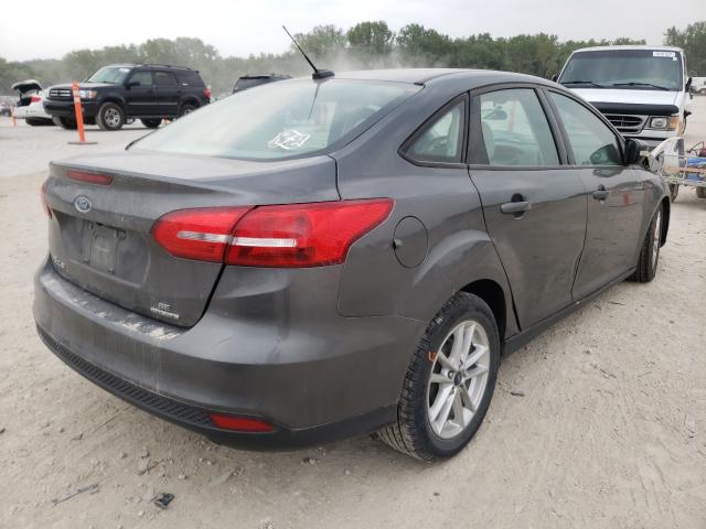Photo 4 from auction – 2016 FORD FOCUS SE with VIN 1FADP3F21GL361291
