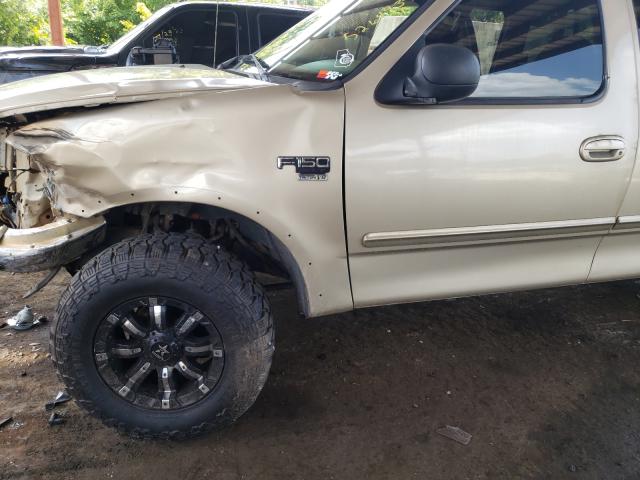 Photo 10 from auction – 2000 FORD F150 with VIN 1FTRX18L0YNA84651
