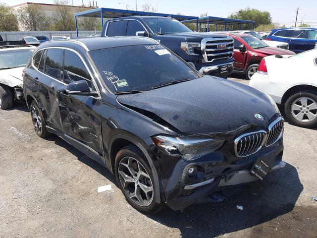 BMW X1 XDRIVE2 2018 with VIN WBXHT3C32J5F88995 - Photo from auction