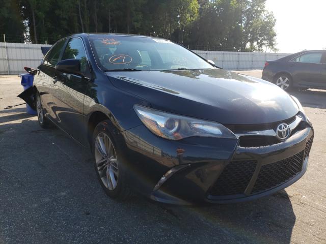 TOYOTA CAMRY LE 2017 with VIN 4T1BF1FKXHU623227 - Photo from auction