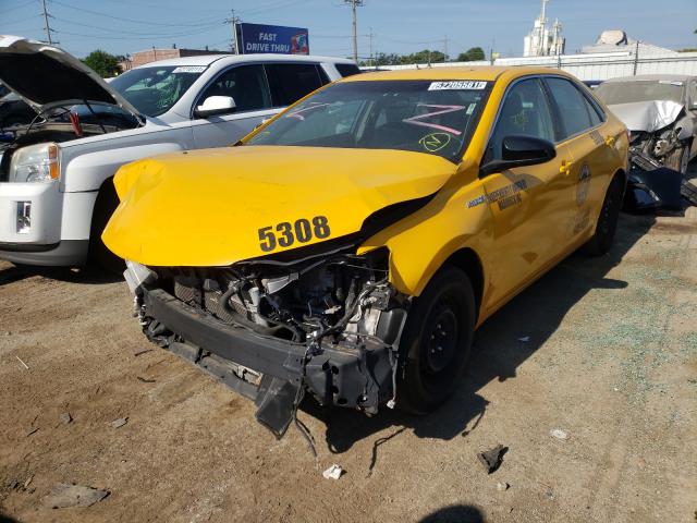 Photo 2 from auction – 2016 TOYOTA CAMRY HYBR with VIN 4T1BD1FK8GU184808