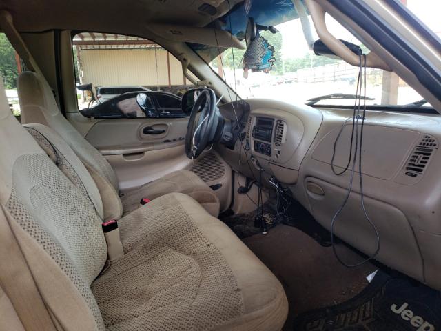 Photo 5 from auction – 2000 FORD F150 with VIN 1FTRX18L0YNA84651