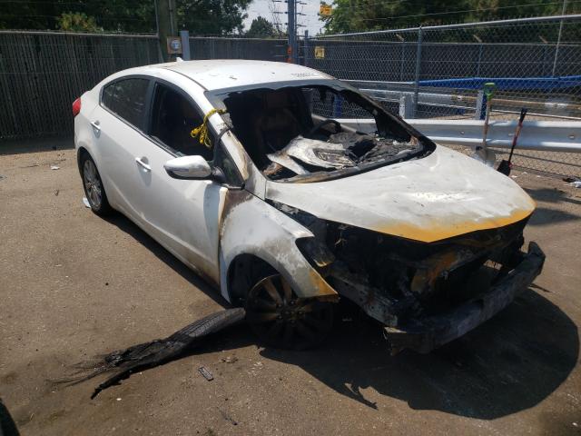 KIA FORTE EX 2014 with VIN KNAFX4A84E5051543 - Photo from auction
