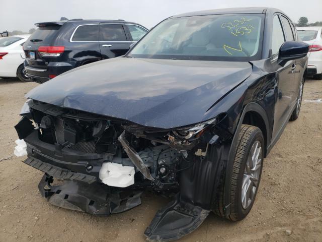Photo 2 from auction – 2021 MAZDA CX-5 GRAND with VIN JM3KFBDM4M1370066