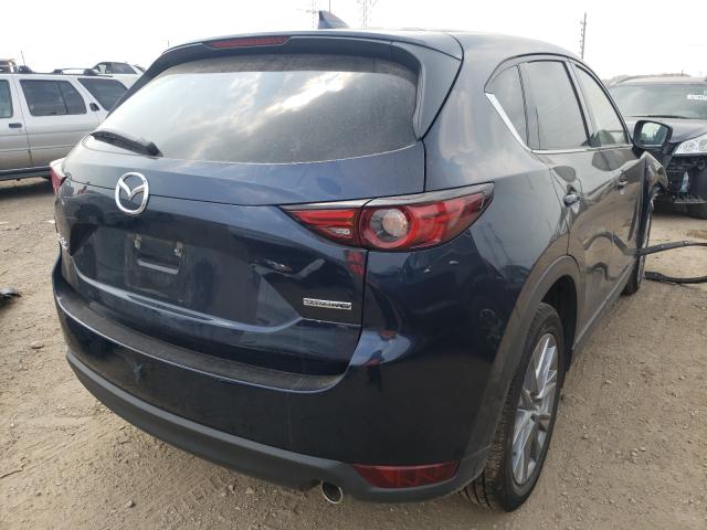Photo 4 from auction – 2021 MAZDA CX-5 GRAND with VIN JM3KFBDM4M1370066
