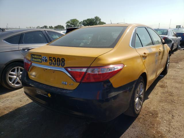 Photo 4 from auction – 2016 TOYOTA CAMRY HYBR with VIN 4T1BD1FK8GU184808