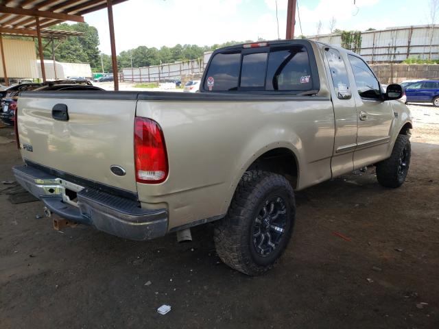 Photo 4 from auction – 2000 FORD F150 with VIN 1FTRX18L0YNA84651