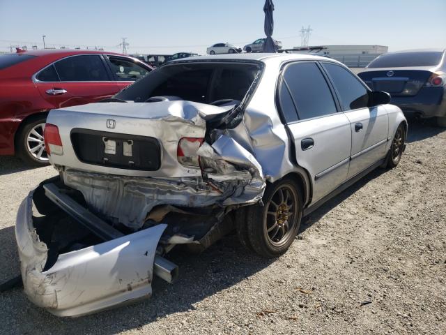 Photo 4 from auction – 1998 HONDA CIVIC LX with VIN 2HGEJ6675WH587764