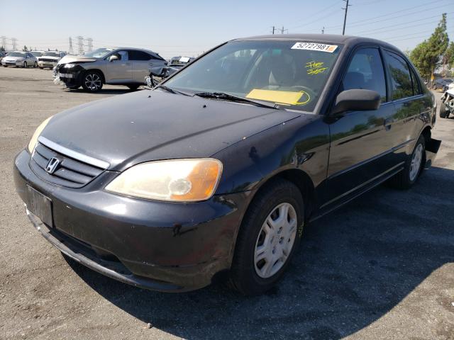 Photo 2 from auction – 2002 HONDA CIVIC LX with VIN 2HGES15542H573879