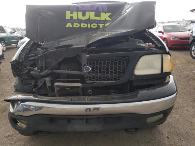 Photo 9 from auction – 2000 FORD F150 with VIN 1FTRX18LXYNA86049