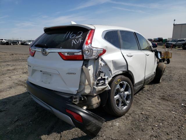Photo 4 from auction – 2019 HONDA CR-V EX with VIN 5J6RW2H55KA011035