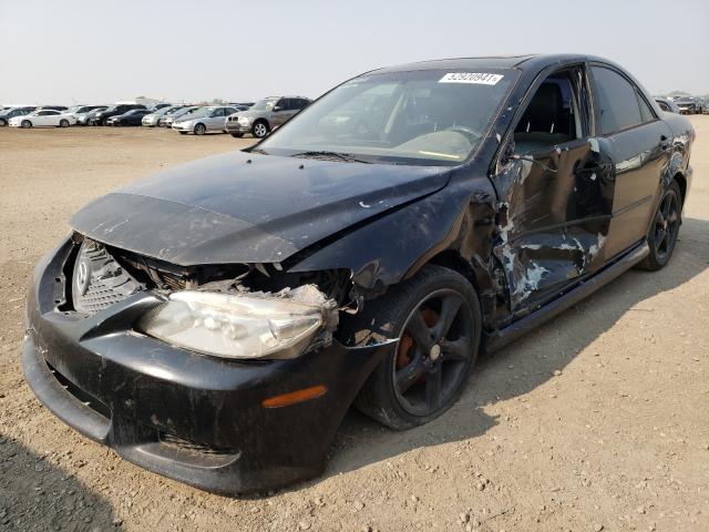 Photo 2 from auction – 2003 MAZDA 6 S with VIN 1YVHP80D735M07704
