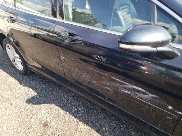 Photo 9 from auction – 2014 FORD FUSION SE with VIN 3FA6P0HD1ER334953