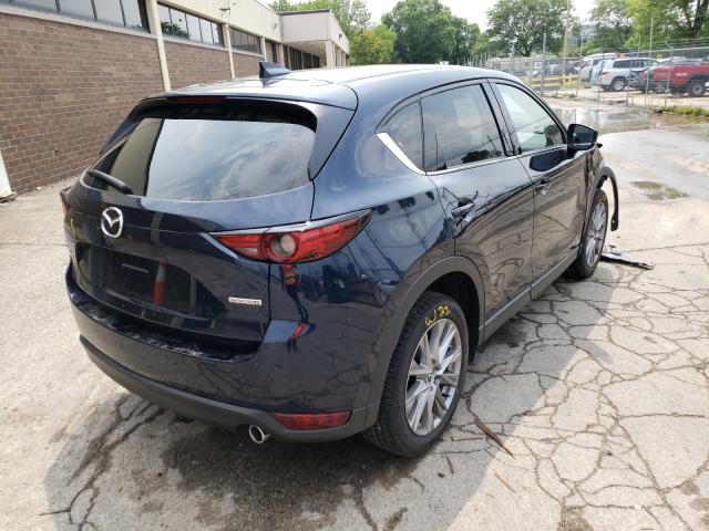 Photo 4 from auction – 2021 MAZDA CX-5 GRAND with VIN JM3KFBDMXM1422851